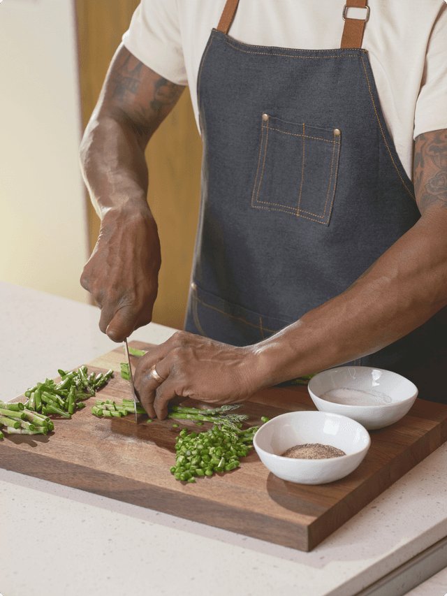 Man chopping brussels sprouts 