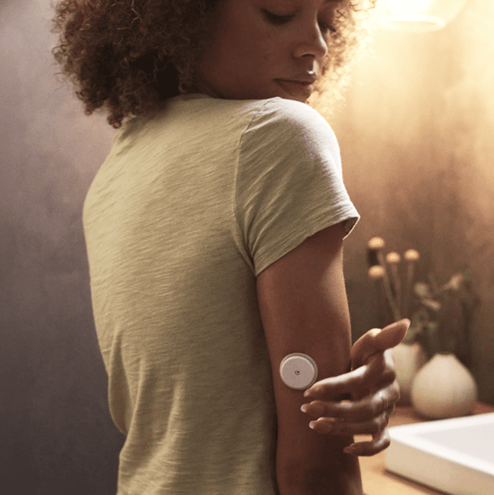 Woman wearing a CGM