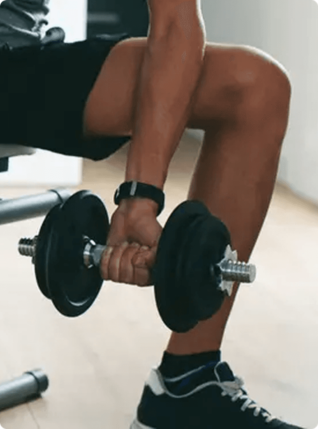 A man weight lifting in a gym
