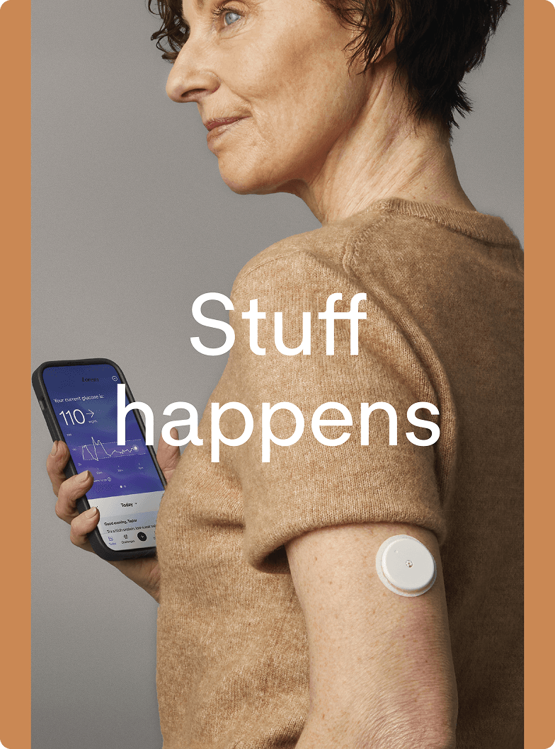 A woman looking at the Lingo app while wearing a Lingo biosensor