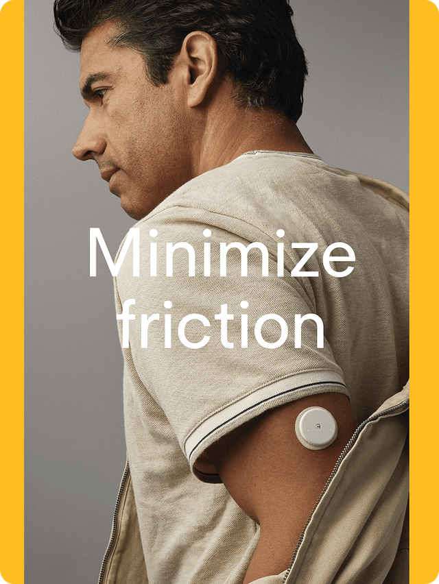 A man looking towards his left side while wearing a Lingo biosensor