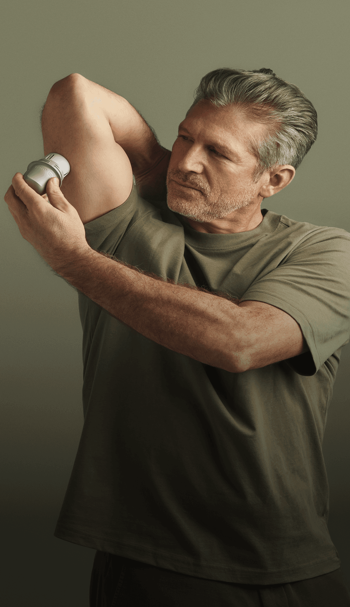 Man putting on a new Lingo biosensor on his arm.