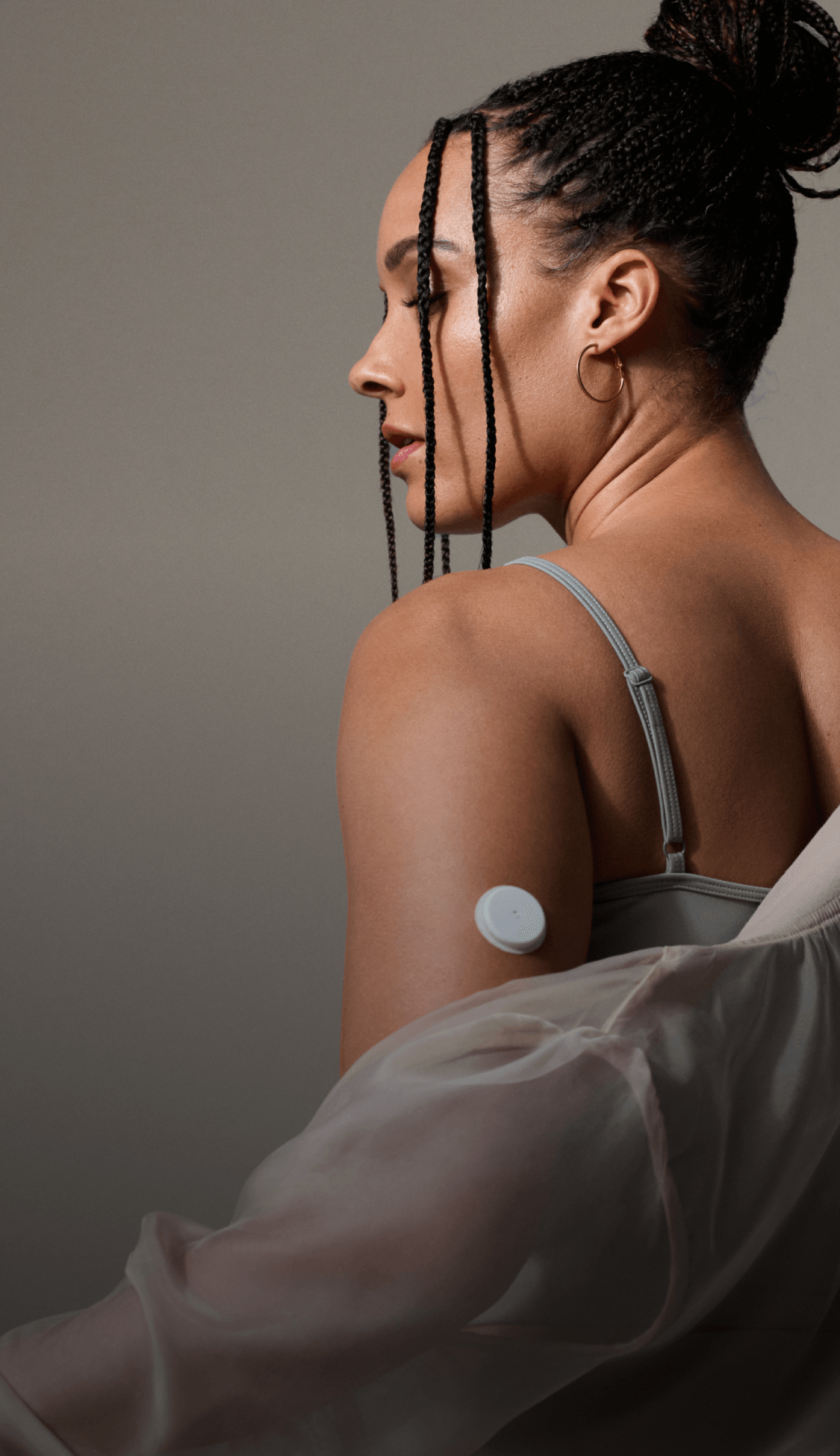 Woman wearing biosensor