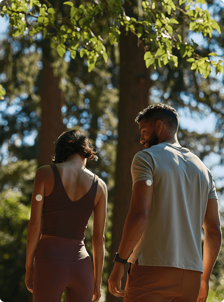 Couple walking in trees