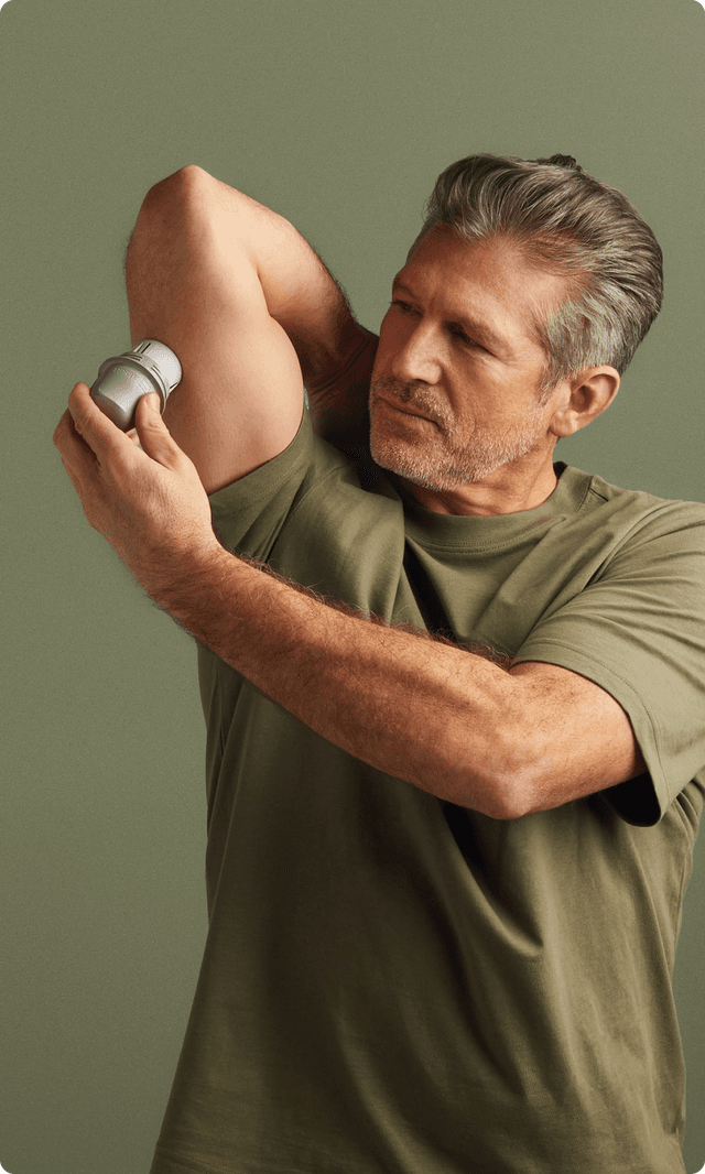 A man applying a biosensor