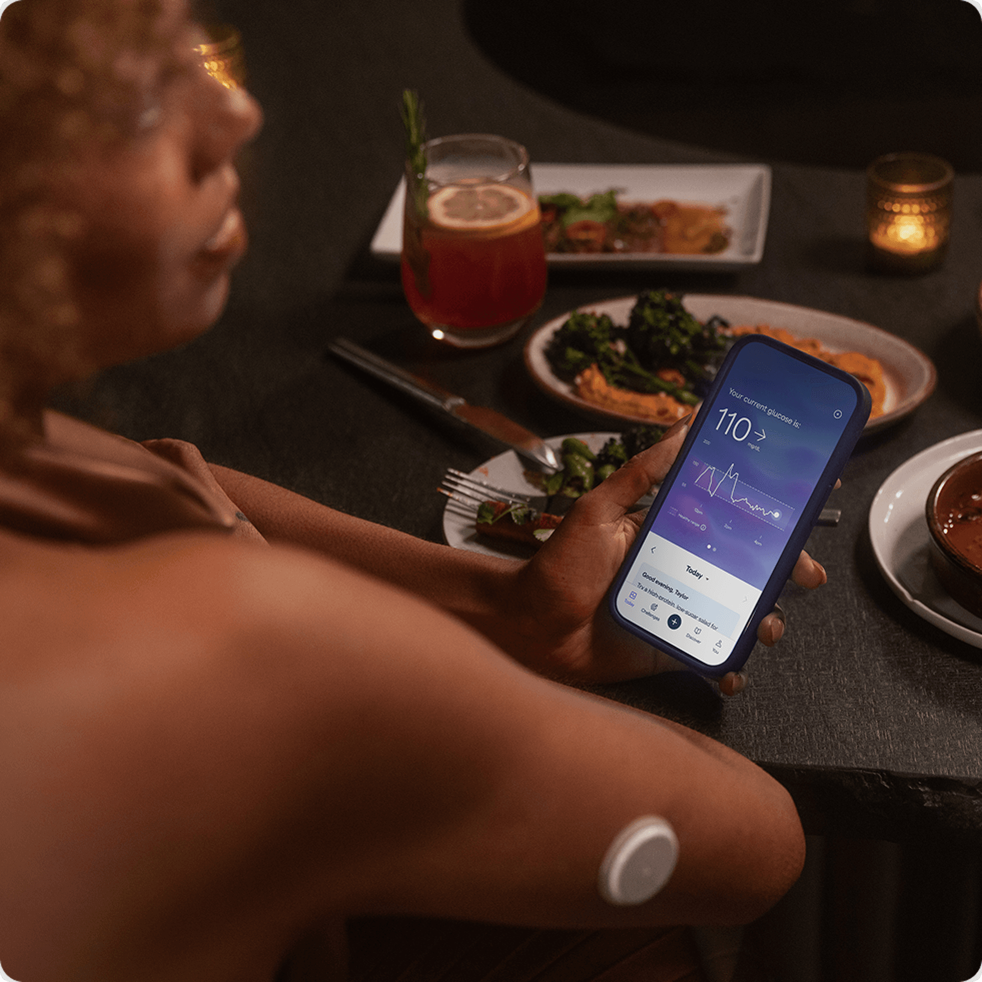 Woman looking at phone with data