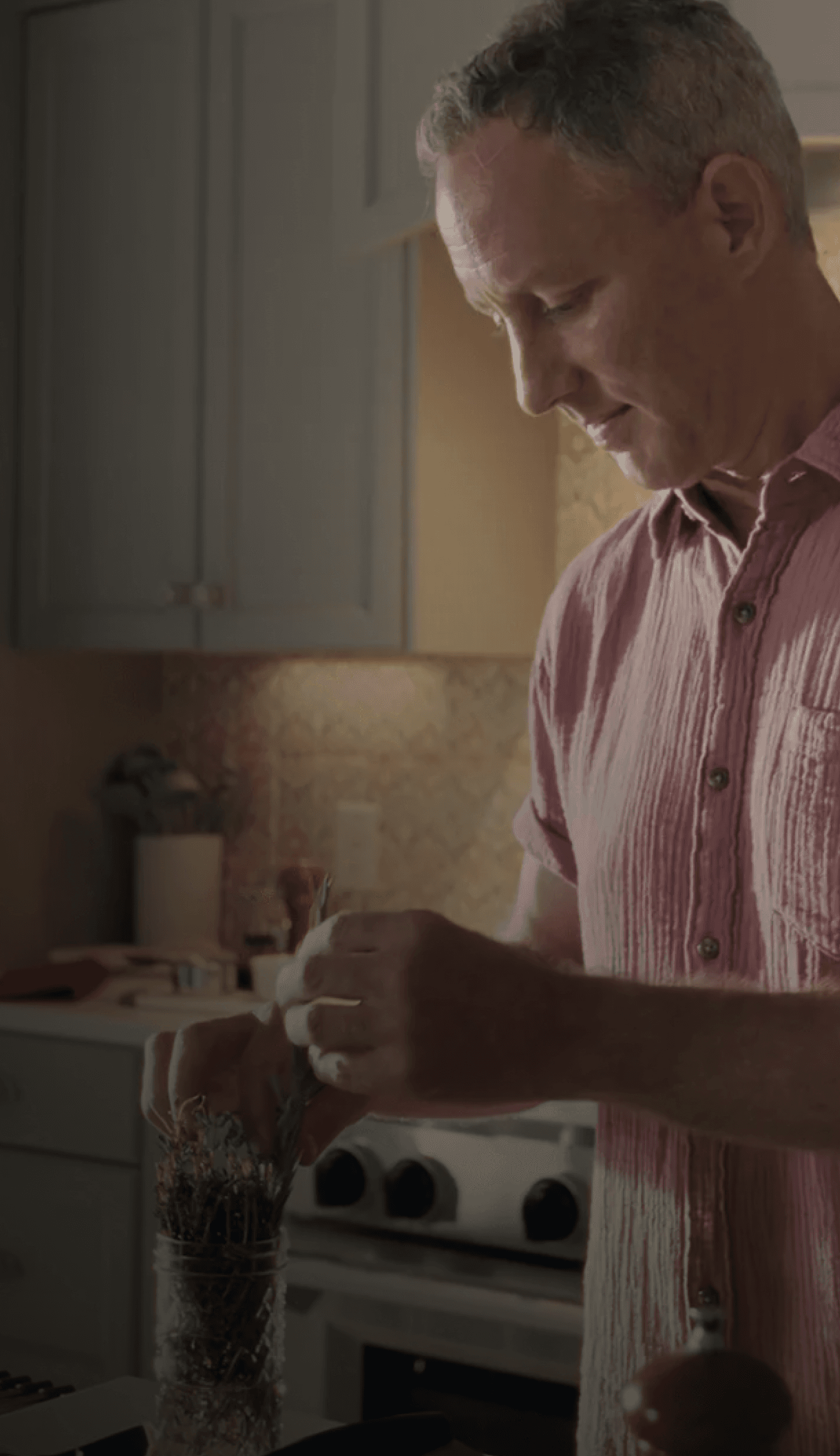A man cooking a meal in his kitchen
