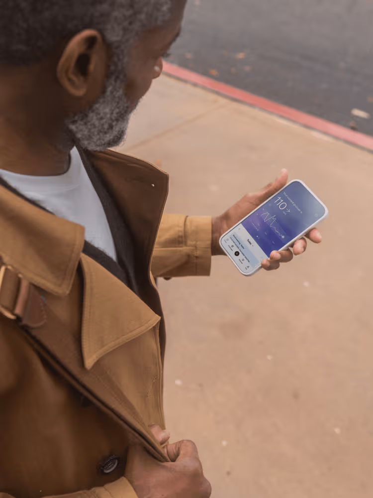Woman looking at phone with data