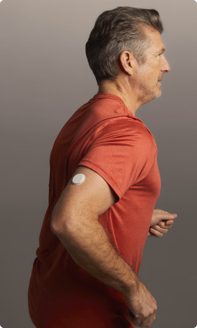 A man running wearing a Lingo biosensor