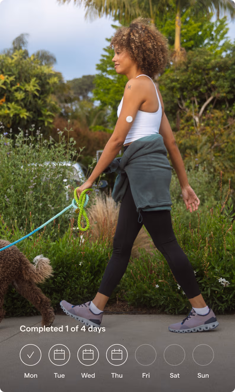 A woman walking her dog