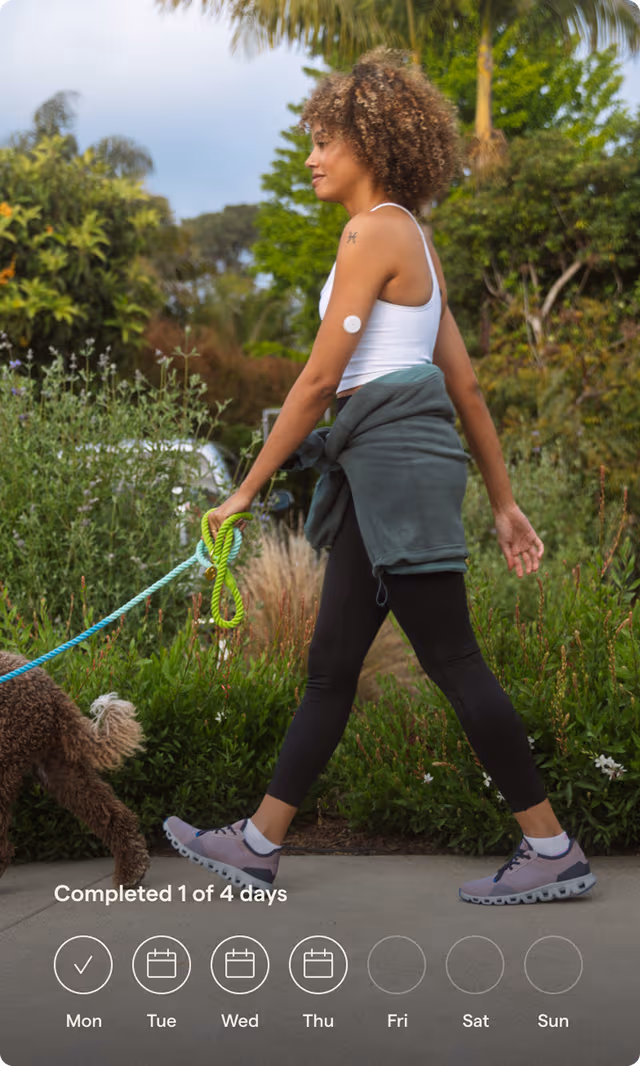 A woman walking her dog
