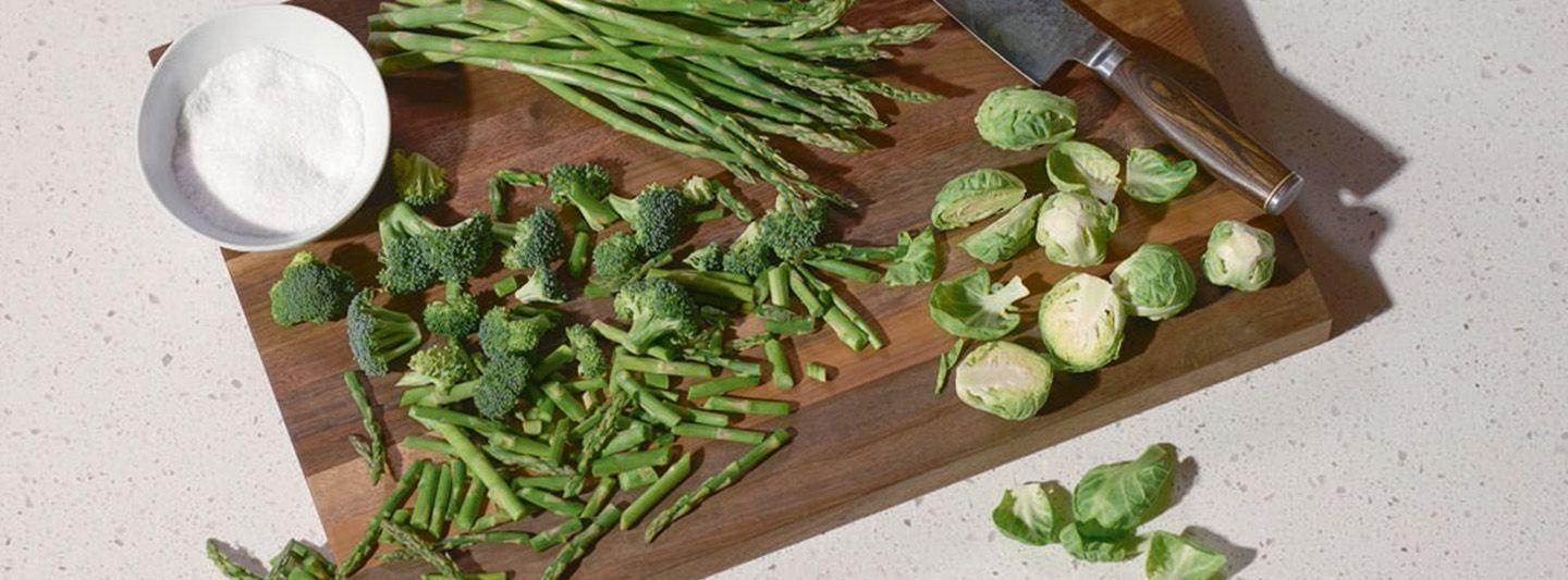 Green vegetables on a chopping board
