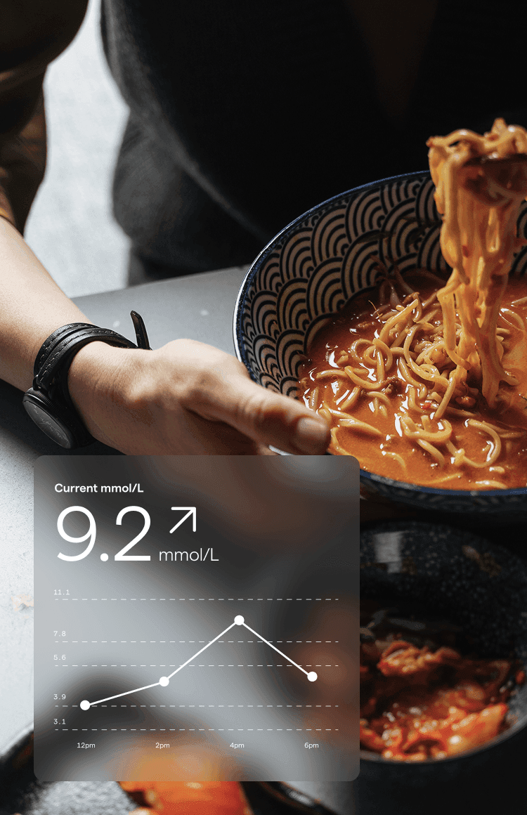 Person eating ramen noodles