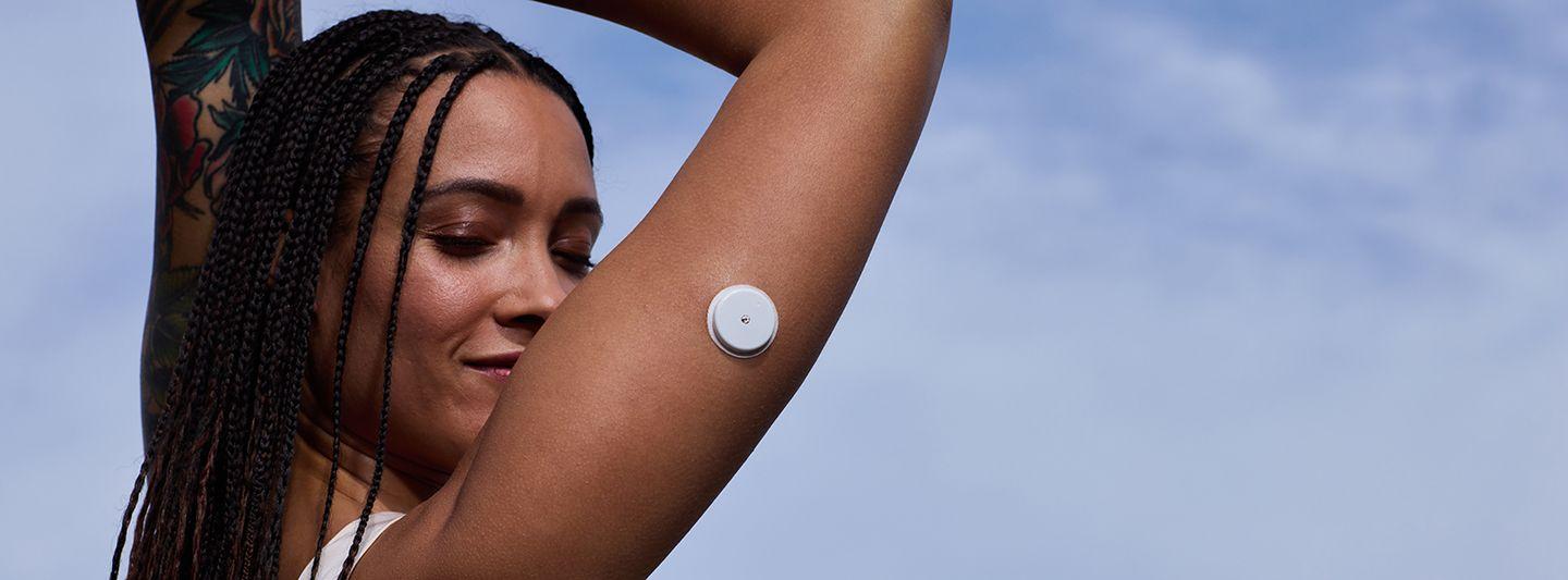 Woman wearing a CGM