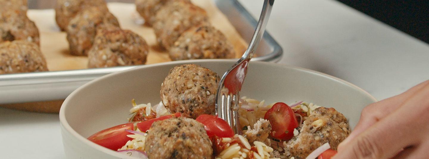 Turkey meatballs with orzo and greek salad