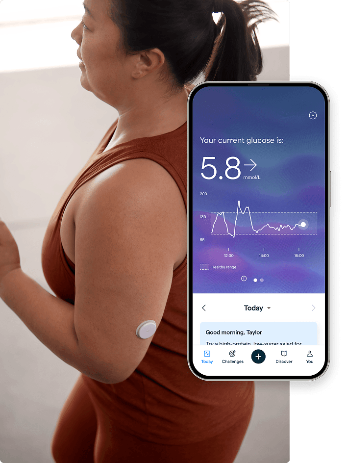 Woman jogging in workout clothing with a phone screen showing glucose results.