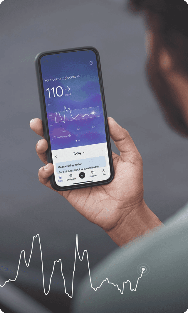 A person looking at their glucose data on their Lingo app