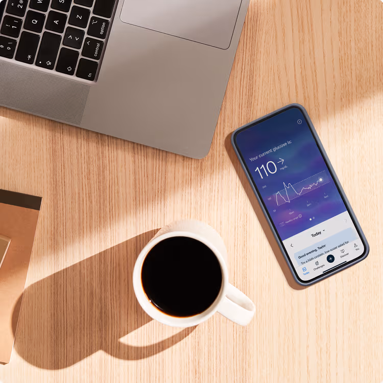 Image of a phone with the Lingo App open on a desk