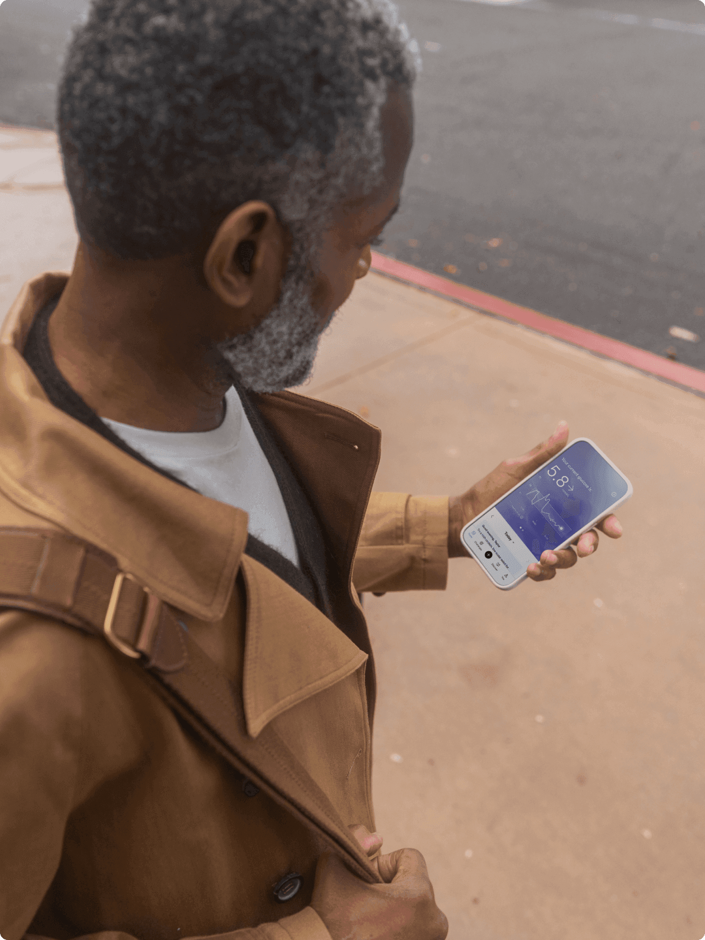 Woman looking at phone with data