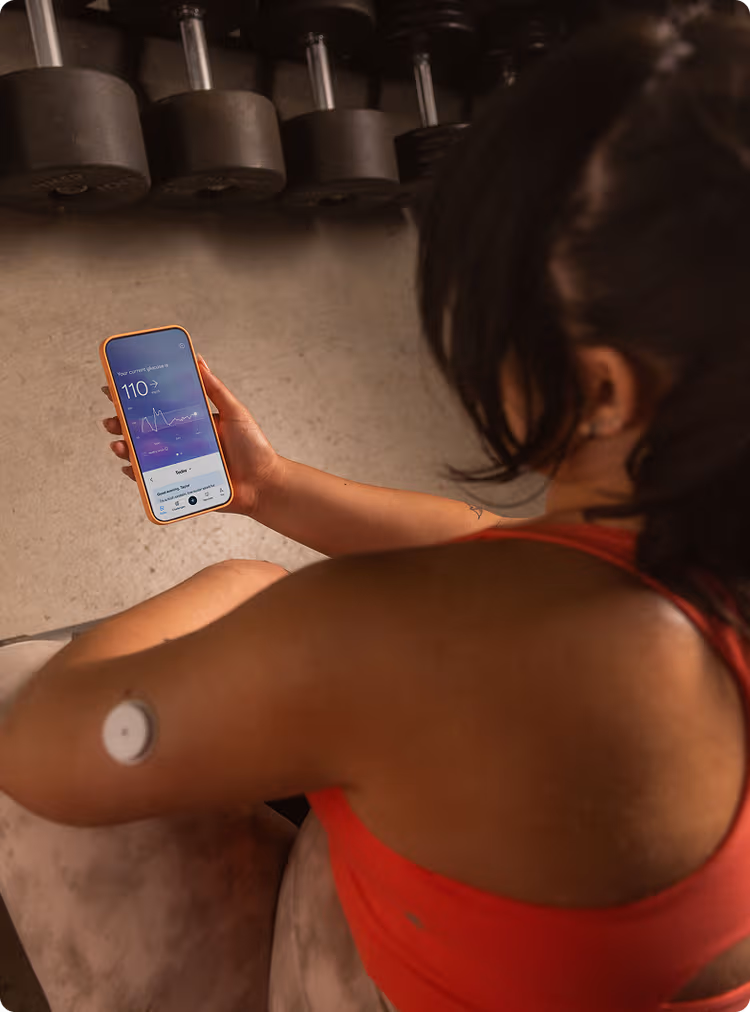 Woman looking at phone with data