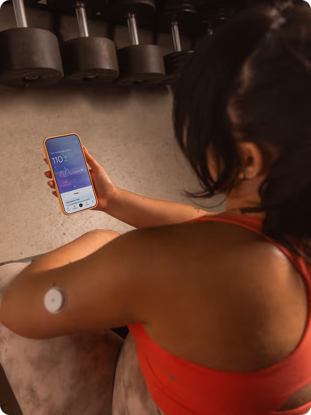 Woman looking at phone with data