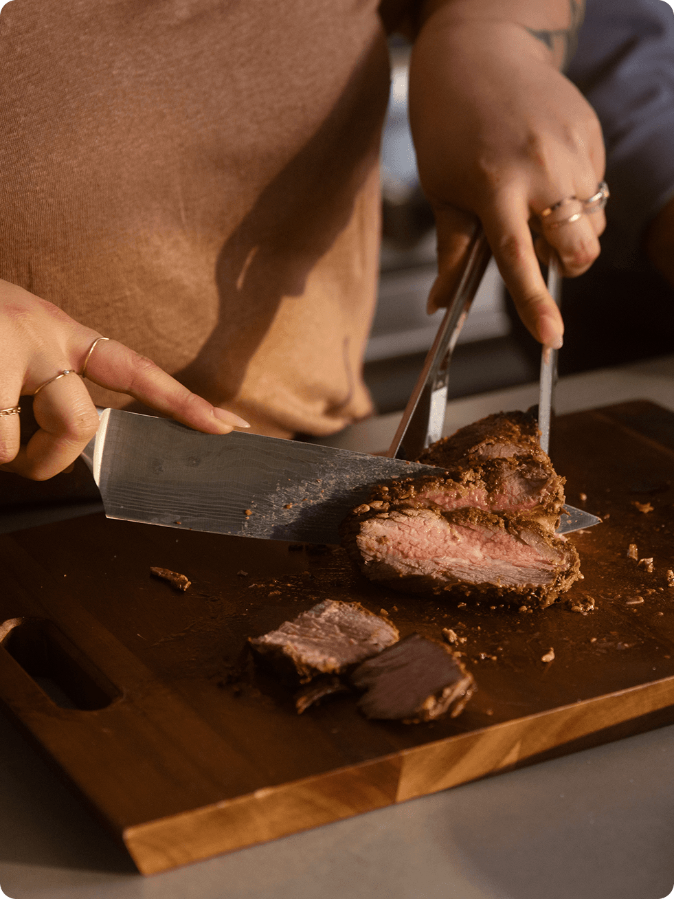 Person cutting steak